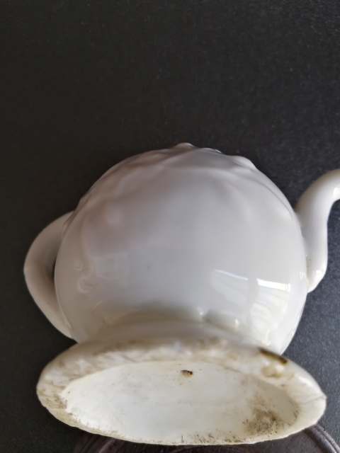 古玩陶瓷放漏 德化窯印花花卉紋倒流壺拍賣,當前價格1280元