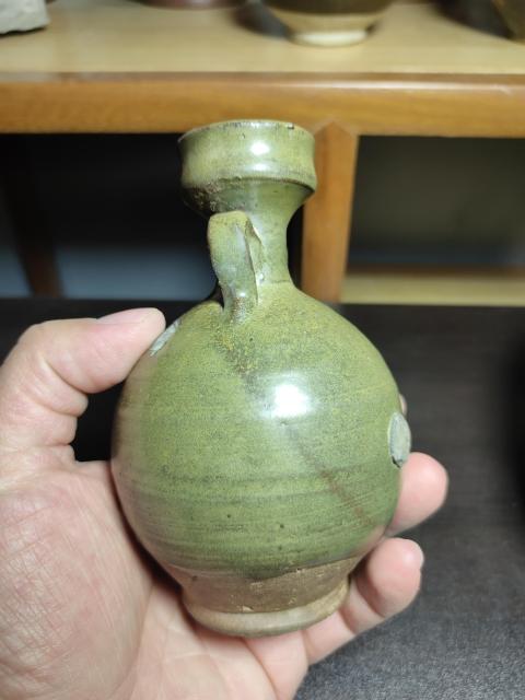 古玩陶瓷唐代?耀州窯茶葉末釉雙系盤口凈瓶拍賣,當前價格4800元