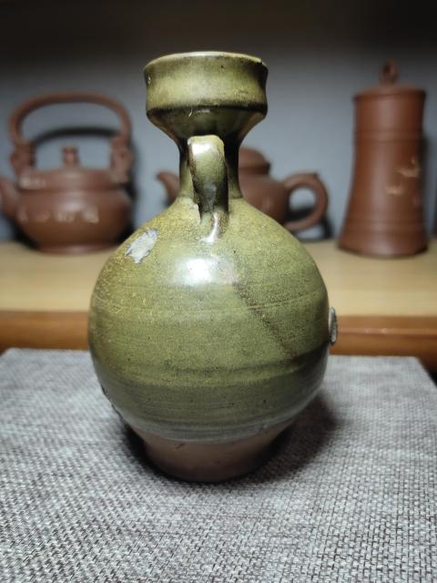 古玩陶瓷唐代?耀州窯茶葉末釉雙系盤口凈瓶拍賣,當前價格4800元