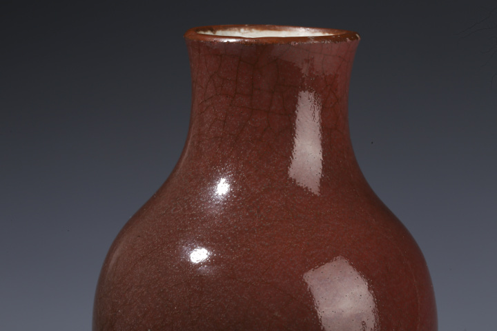 古玩陶瓷紅釉觀音瓶真品鑒賞圖