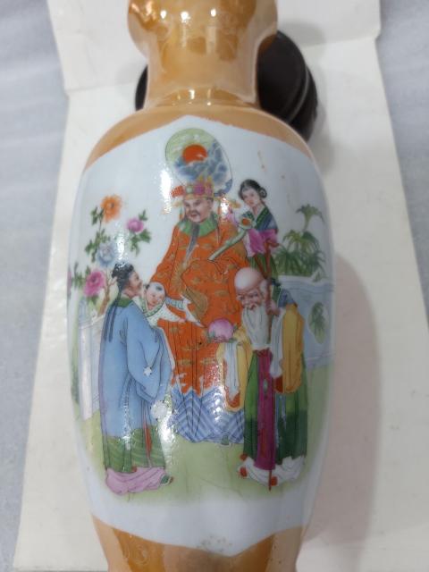 古玩陶瓷創(chuàng)匯電光橘色釉開窗福祿壽喜觀音瓶拍賣,當(dāng)前價格0元