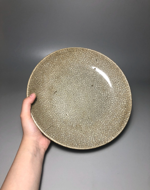 古玩陶瓷清代乾隆景德鎮(zhèn)窯口哥釉七星盤拍賣,當(dāng)前價格3888元