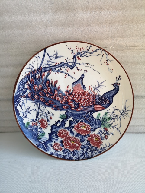 古玩陶瓷上一個世紀晚期孔雀盤拍賣，當前價格398元