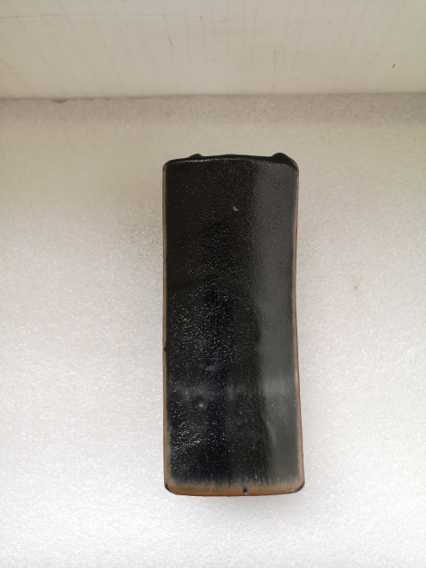 古玩陶瓷明末清初磁州窯系黑釉鏤空銀錠型瓷枕拍賣,當前價格750元