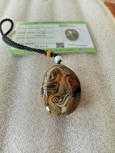 古玩玉器天然纏絲瑪瑙把件拍賣,當(dāng)前價格260元