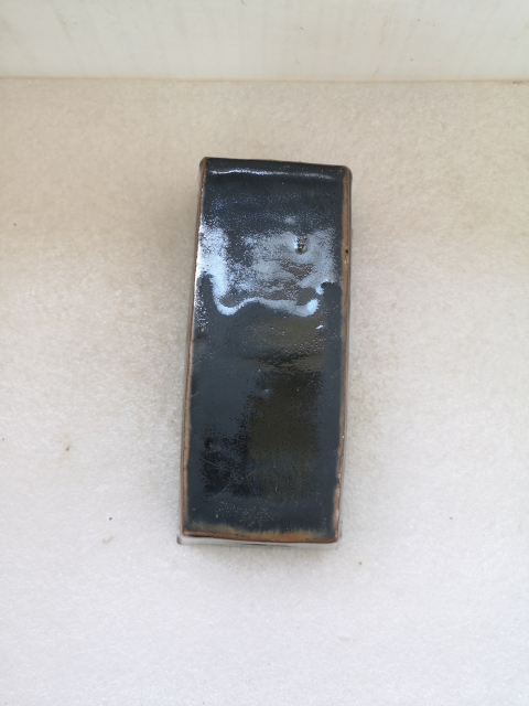 古玩陶瓷磁州窯系黑釉鏤空銀錠型瓷枕拍賣,當(dāng)前價(jià)格680元