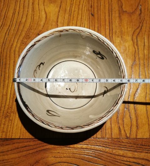 古玩陶瓷元代?白地褐彩花卉紋碗拍賣,當前價格299元