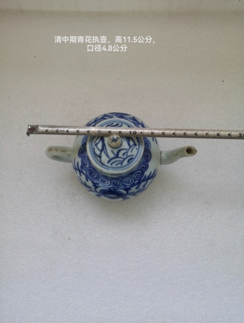 古玩陶瓷花卉紋青花執(zhí)壺拍賣,當(dāng)前價(jià)格850元