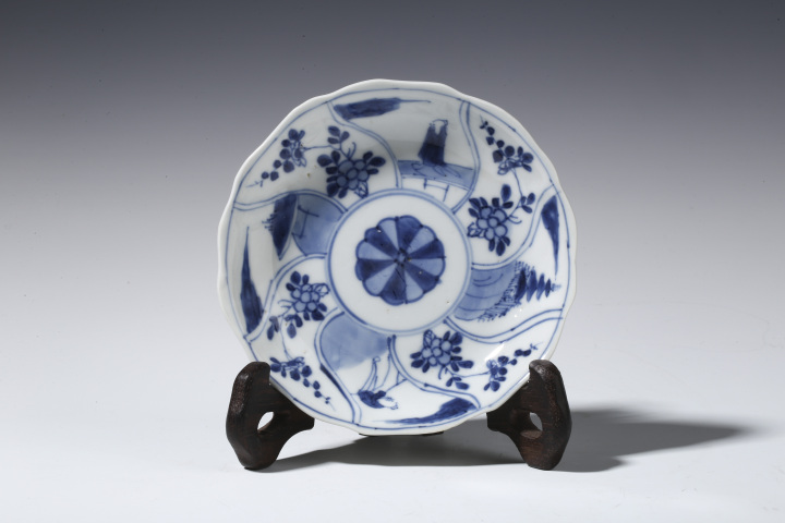 古玩陶瓷·青花開窗山水人物花卉紋花口杯碟
真品鑒賞圖