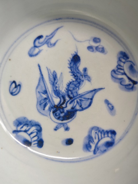 古玩陶瓷明中期青花海水翼龍紋墩式碗拍賣,當前價格6543元