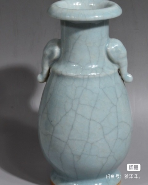 古玩陶瓷清中晚期青哥釉太平有象魚口瓶拍賣，當前價格12800元