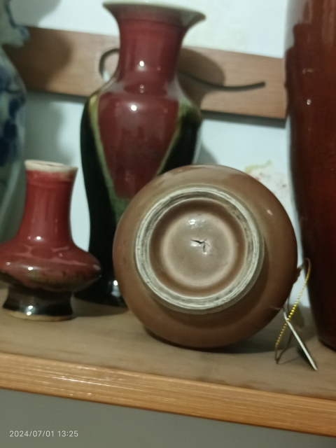 古玩陶瓷嘉慶霽紅釉盤口瓶拍賣,當(dāng)前價(jià)格6900元
