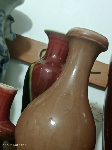 古玩陶瓷嘉慶霽紅釉盤口瓶拍賣,當(dāng)前價(jià)格6900元