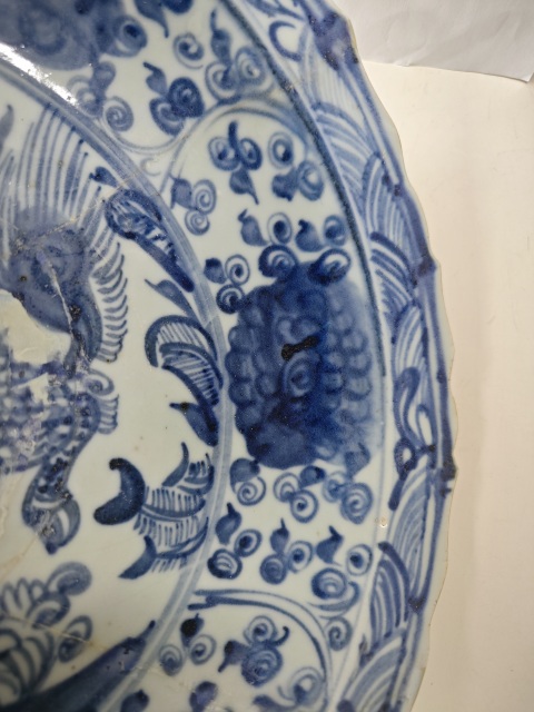 古玩陶瓷明空白期青花麒麟紋菱口盤拍賣，當前價格12345元