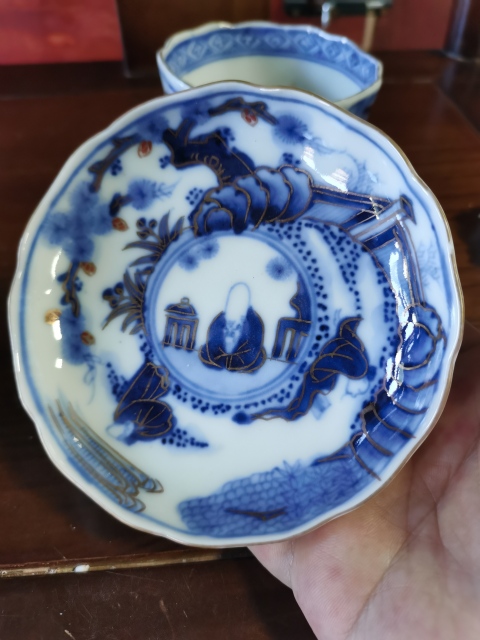 古玩陶瓷十九世紀青花描金山水人物杯碟拍賣,當前價格470元