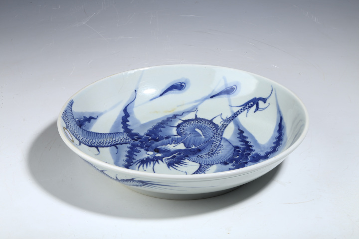 古玩陶瓷清雍正·青花過墻龍紋盤拍賣，當前價格12000元
