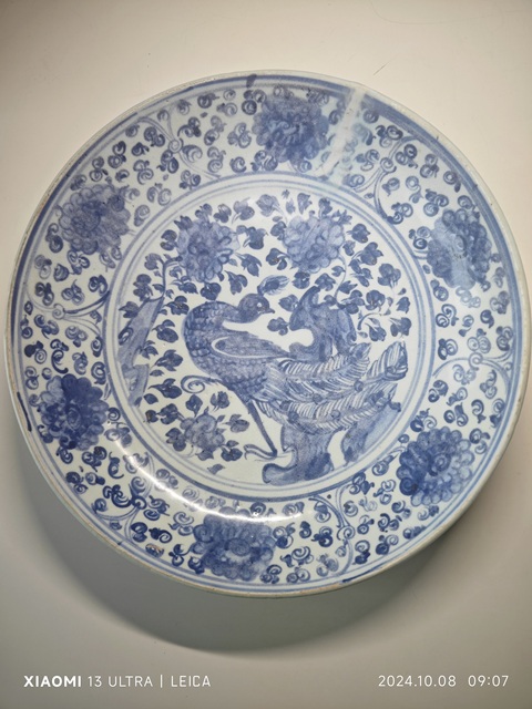 古玩陶瓷明空白期青花孔雀洞石花卉紋盤拍賣,當前價格9876元