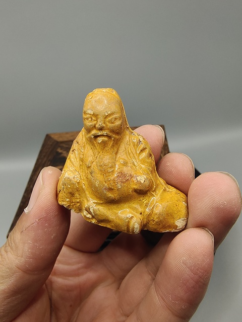 古玩陶瓷明代黃釉壽星造像拍賣,當前價格0元