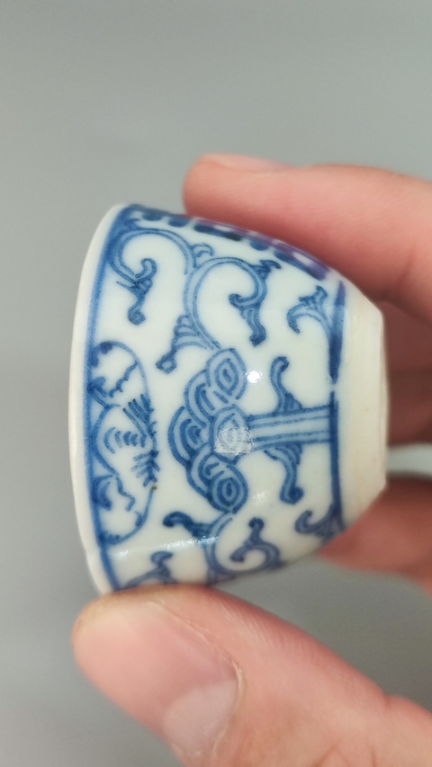 古玩陶瓷清中期青花纏枝喜字紋臥足杯拍賣,當前價格600元
