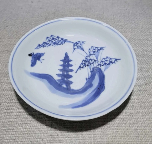 古玩陶瓷明代晚期竹林寶塔青花盤拍賣，當(dāng)前價格1200元