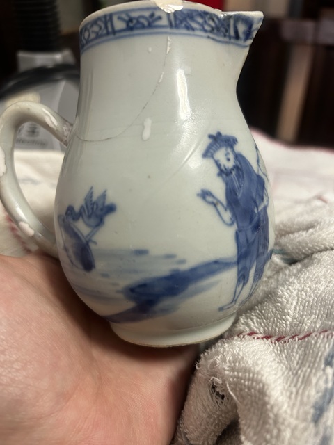 古玩陶瓷清早期鷸蚌相爭漁翁得利青花奶壺拍賣,當前價格299元