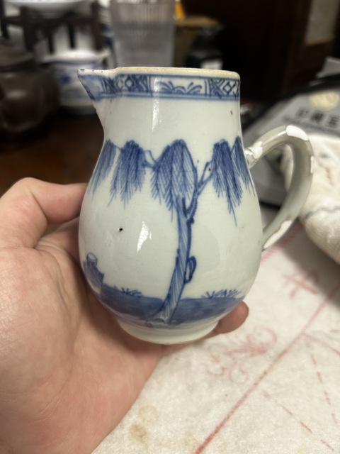 古玩陶瓷清早期鷸蚌相爭漁翁得利青花奶壺拍賣,當前價格299元