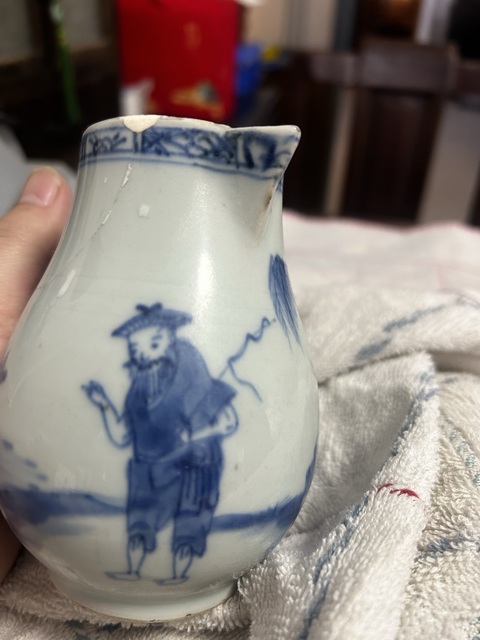 古玩陶瓷清早期鷸蚌相爭漁翁得利青花奶壺拍賣,當前價格299元