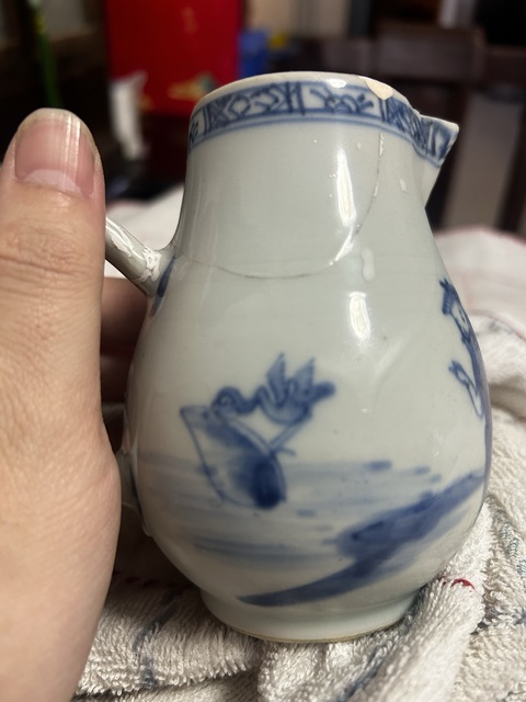 古玩陶瓷清早期鷸蚌相爭漁翁得利青花奶壺拍賣,當前價格299元