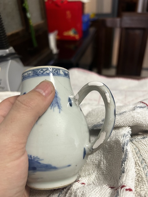 古玩陶瓷清早期鷸蚌相爭漁翁得利青花奶壺拍賣,當前價格299元