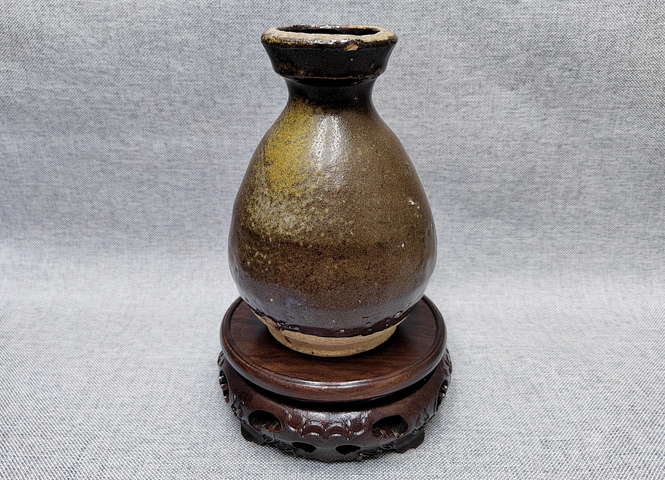 古玩陶瓷元代?茶葉末釉盤口瓶拍賣，當前價格766元