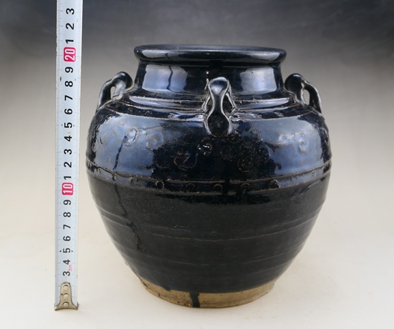 古玩陶瓷明末清初.黑釉模印花卉紋四系罐拍賣,當前價格238元