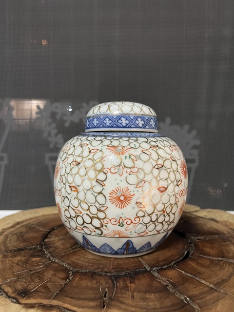 古玩陶瓷青花加彩花卉紋玲瓏罐拍賣,當(dāng)前價(jià)格1200元