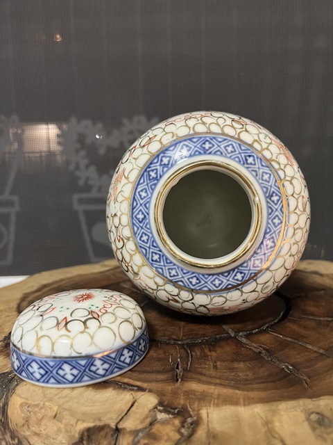 古玩陶瓷青花加彩花卉紋玲瓏罐拍賣,當(dāng)前價(jià)格1200元