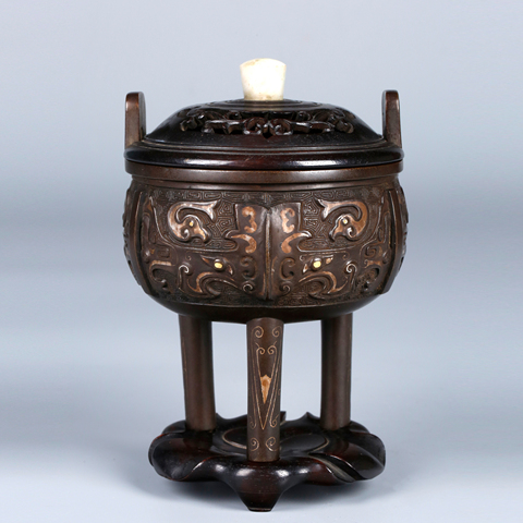 古玩銅器饕餮紋鼎式薰爐真品鑒賞圖