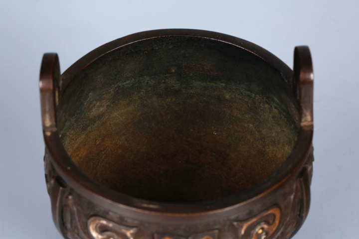 古玩銅器饕餮紋鼎式薰爐真品鑒賞圖