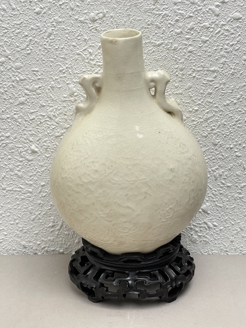 古玩陶瓷仿定窯抱月瓶真品鑒賞圖