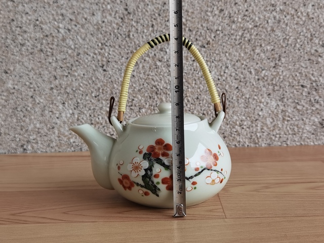 古玩陶瓷梅紋提梁壺拍賣,當前價格298元