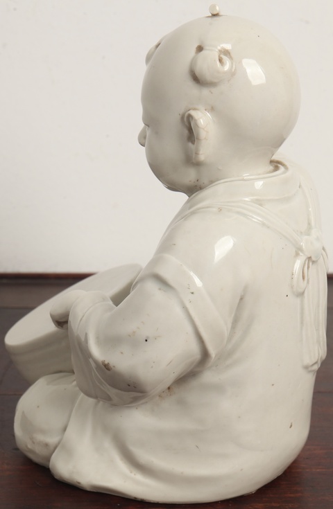 古玩陶瓷擊鼓童子塑像真品鑒賞圖