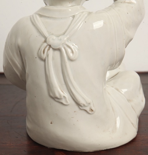 古玩陶瓷擊鼓童子塑像真品鑒賞圖