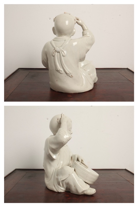古玩陶瓷擊鼓童子塑像真品鑒賞圖