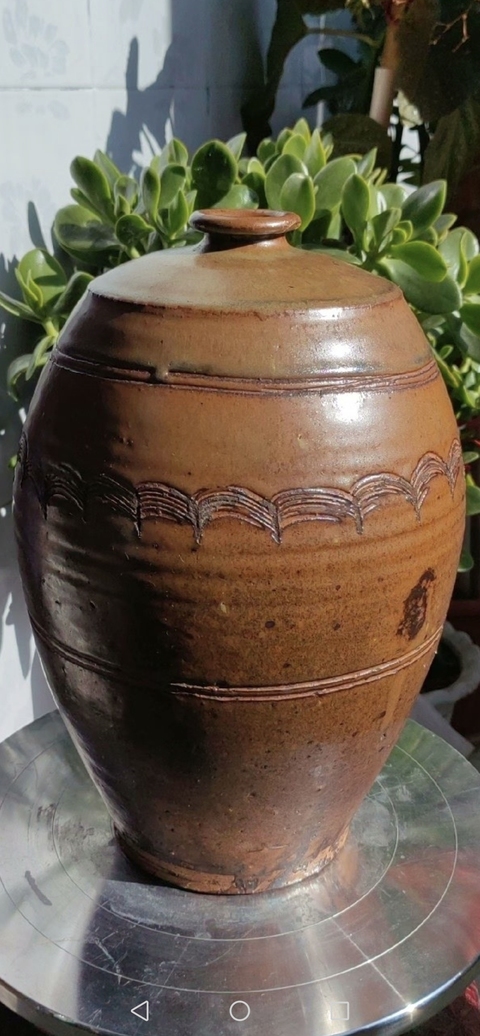 古玩陶瓷褐釉刻水波紋梅瓶真品鑒賞圖