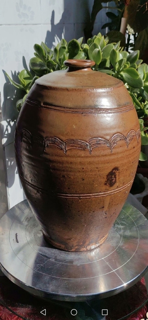 古玩陶瓷褐釉刻水波紋梅瓶真品鑒賞圖