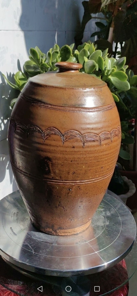 古玩陶瓷褐釉刻水波紋梅瓶真品鑒賞圖