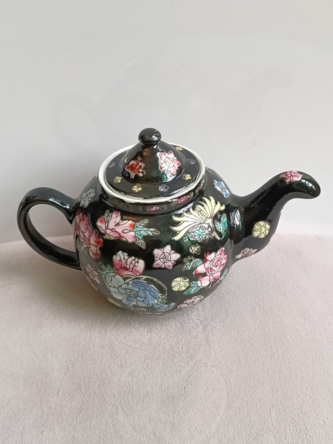 古玩陶瓷墨地粉彩花卉紋茶壺拍賣,當前價格355元