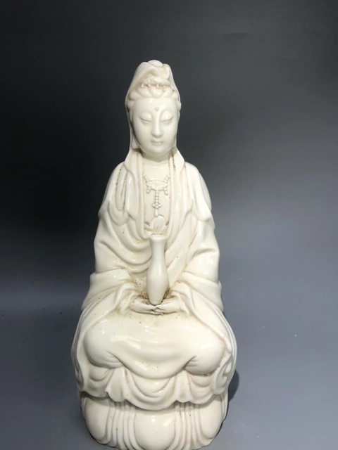 古玩陶瓷白釉觀音瓷塑真品鑒賞圖