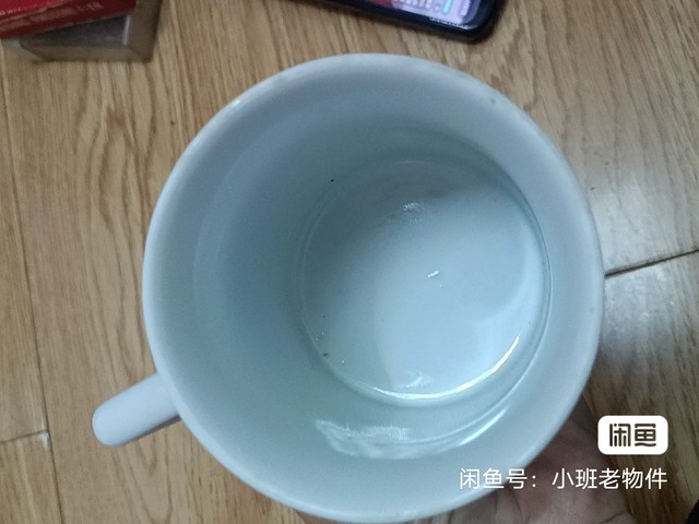 古玩陶瓷雪景圖執杯真品鑒賞圖