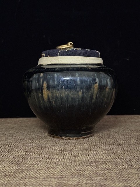 古玩陶瓷窯變黑釉茶入真品鑒賞圖