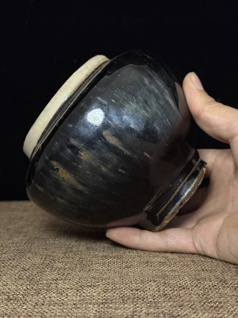 古玩陶瓷窯變黑釉茶入真品鑒賞圖