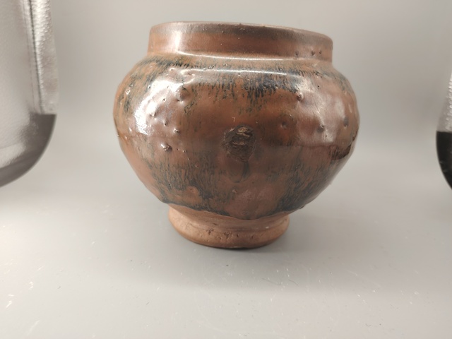 古玩陶瓷窯變黑釉罐真品鑒賞圖