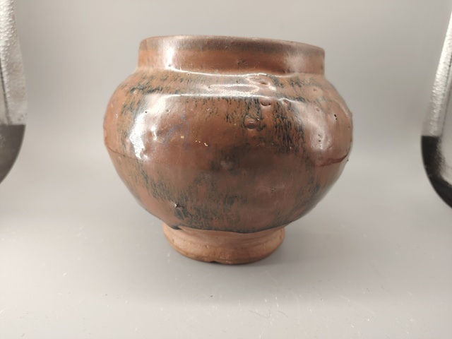 古玩陶瓷窯變黑釉罐真品鑒賞圖